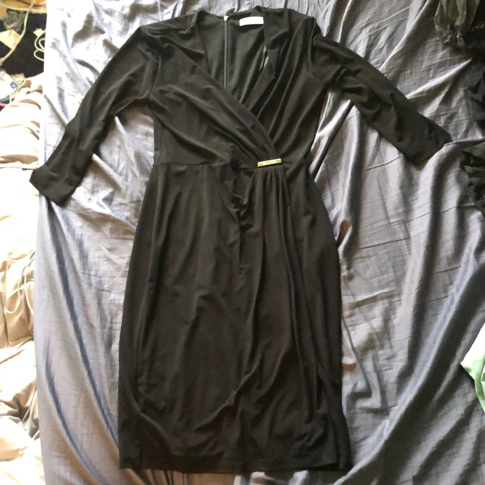 Black slim fit dress 3/4 sleeve by Calvin Klein.